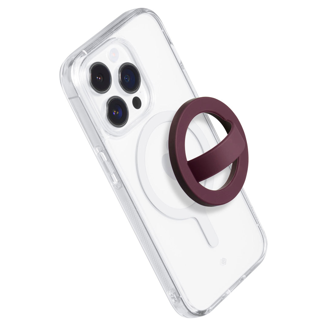 AFA07065 - MagSafe Silicone Phone Holder in burgundy color next to a phone