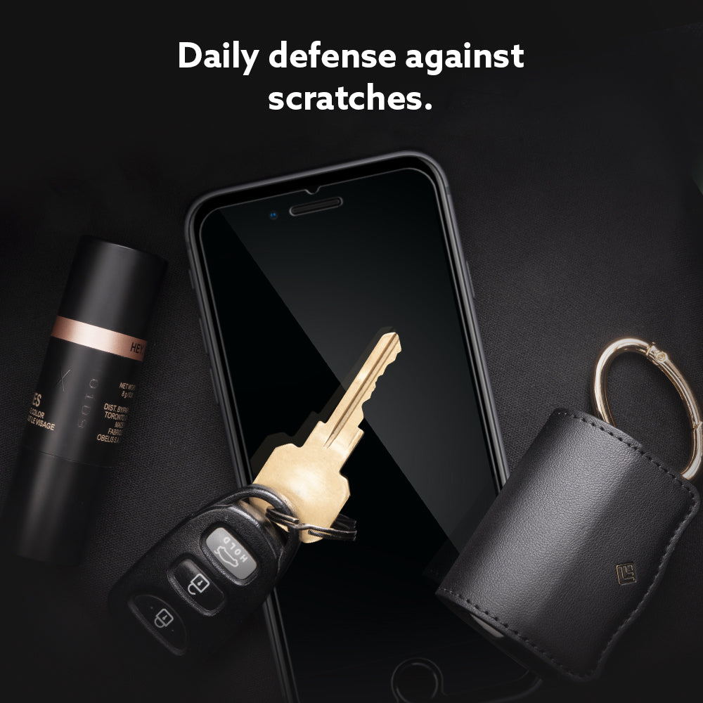 AGL01004 - iPhone 8/7 Glass Screen Protector (v.2) showing that the screen protector will provide a daily defense against scratches against keys, Airpods and other daily essentials